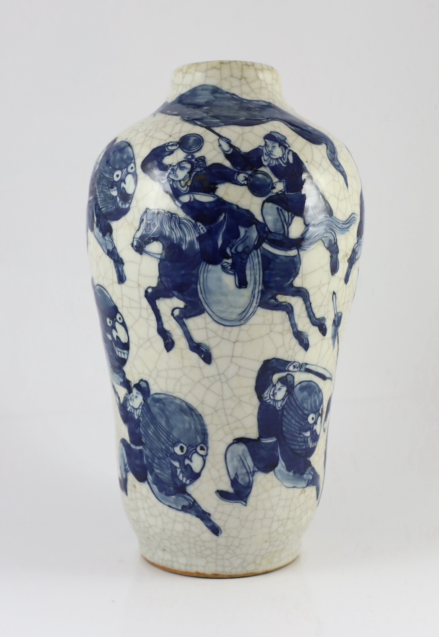 A Chinese blue and white crackle glaze ‘warriors’ vase, late 19th century, 35cm high, drilled hole